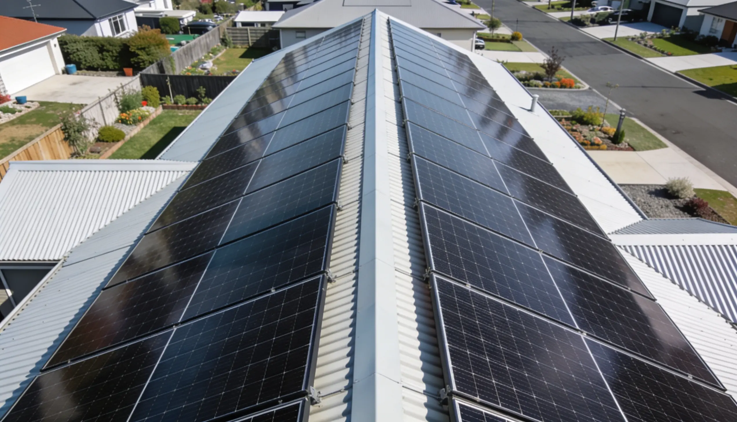 Solar panels on a New Zealand home roof — how grid-connected solar power works.